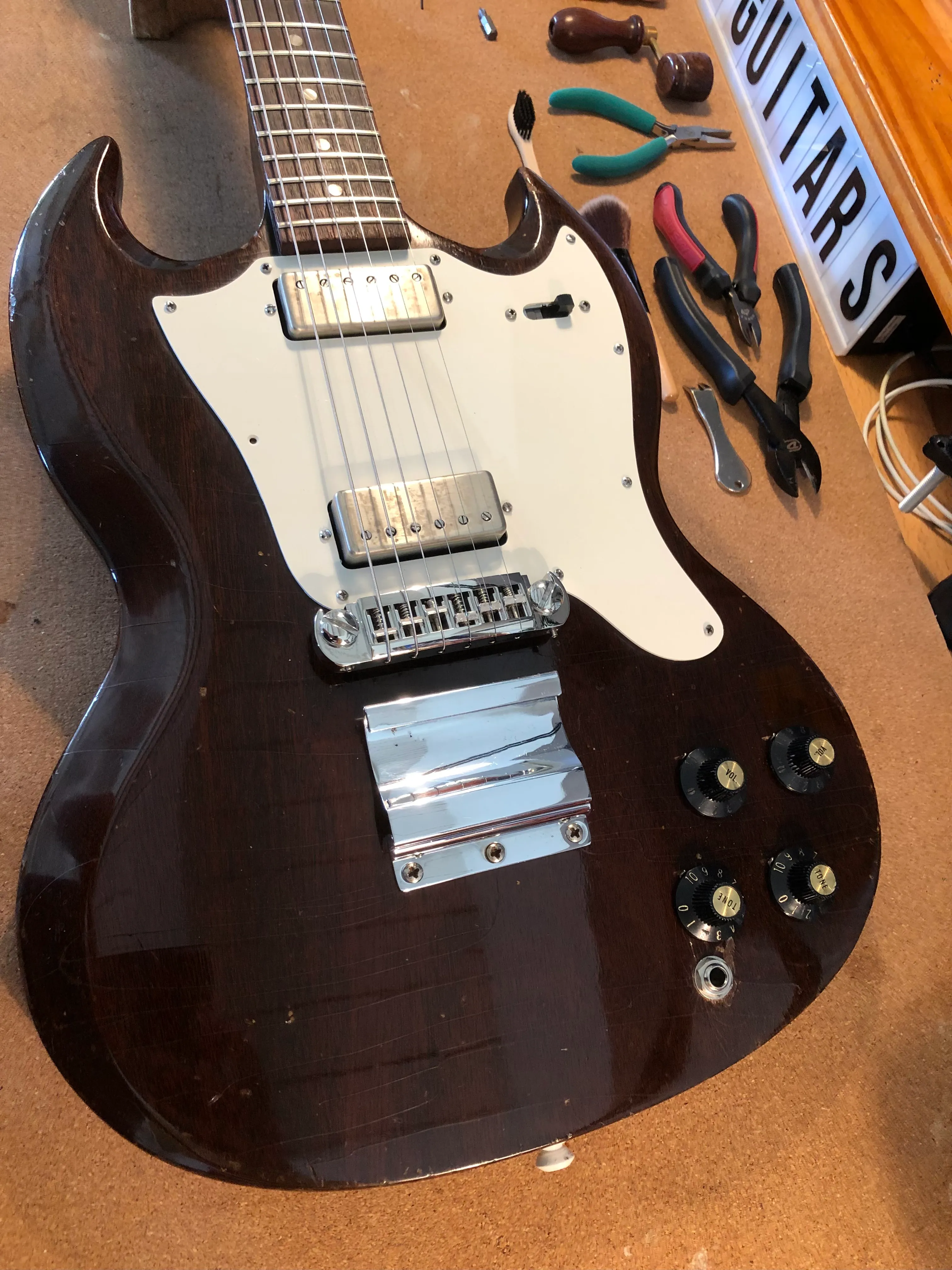 Gallery image 9 showing guitar repair work