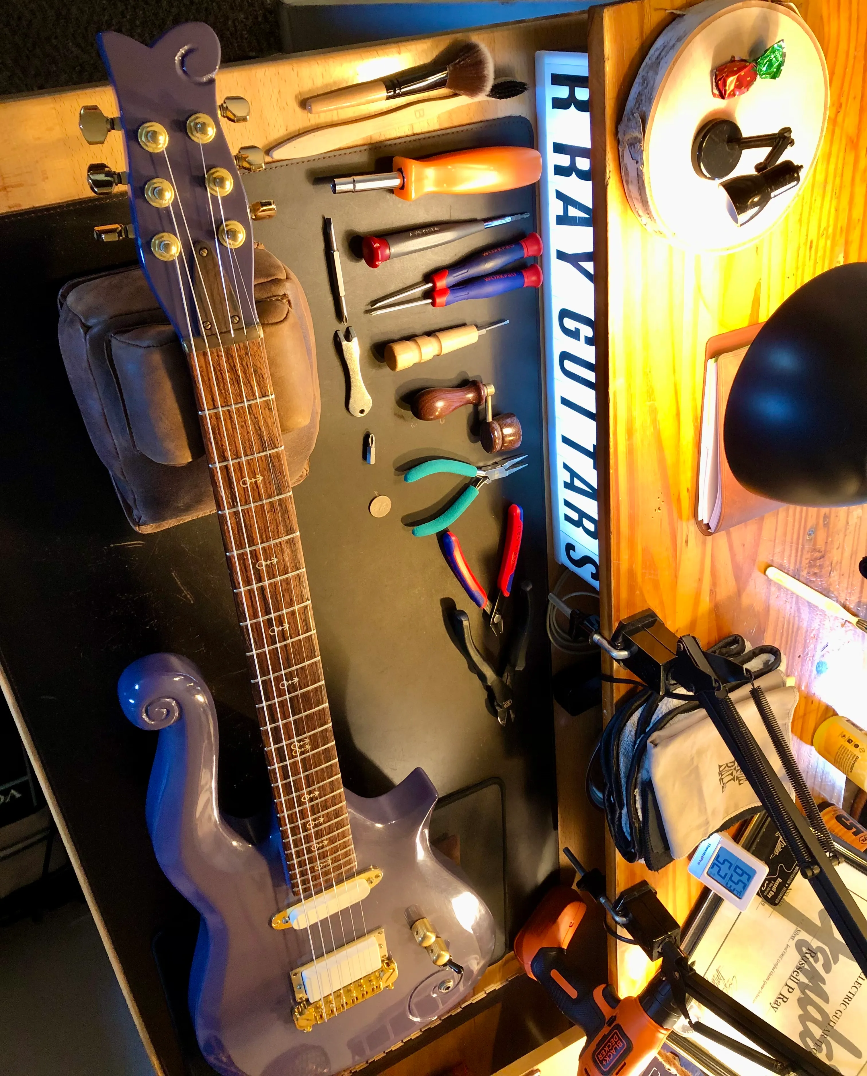 Gallery image 10 showing guitar repair work