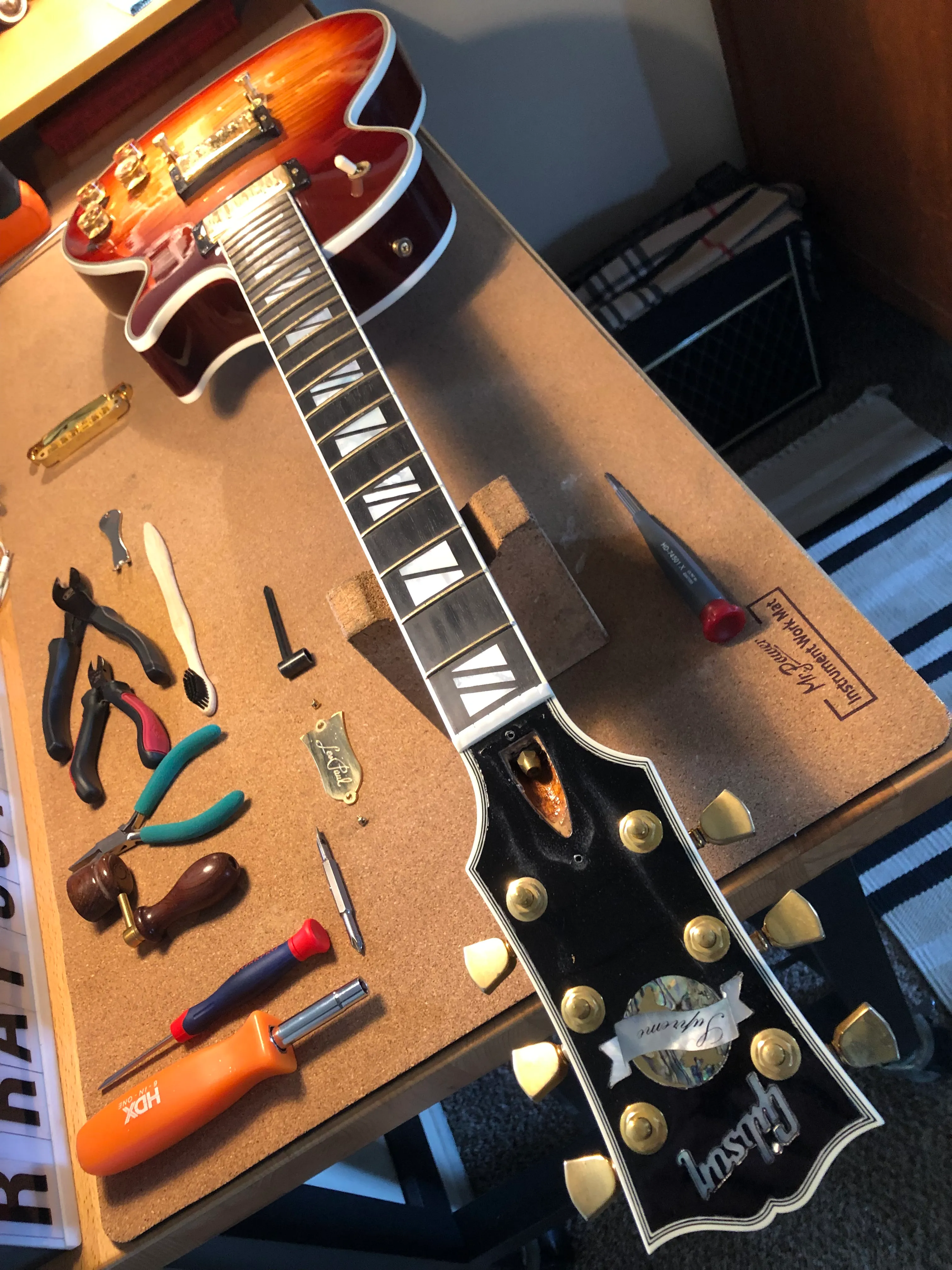 Gallery image 17 showing guitar repair work