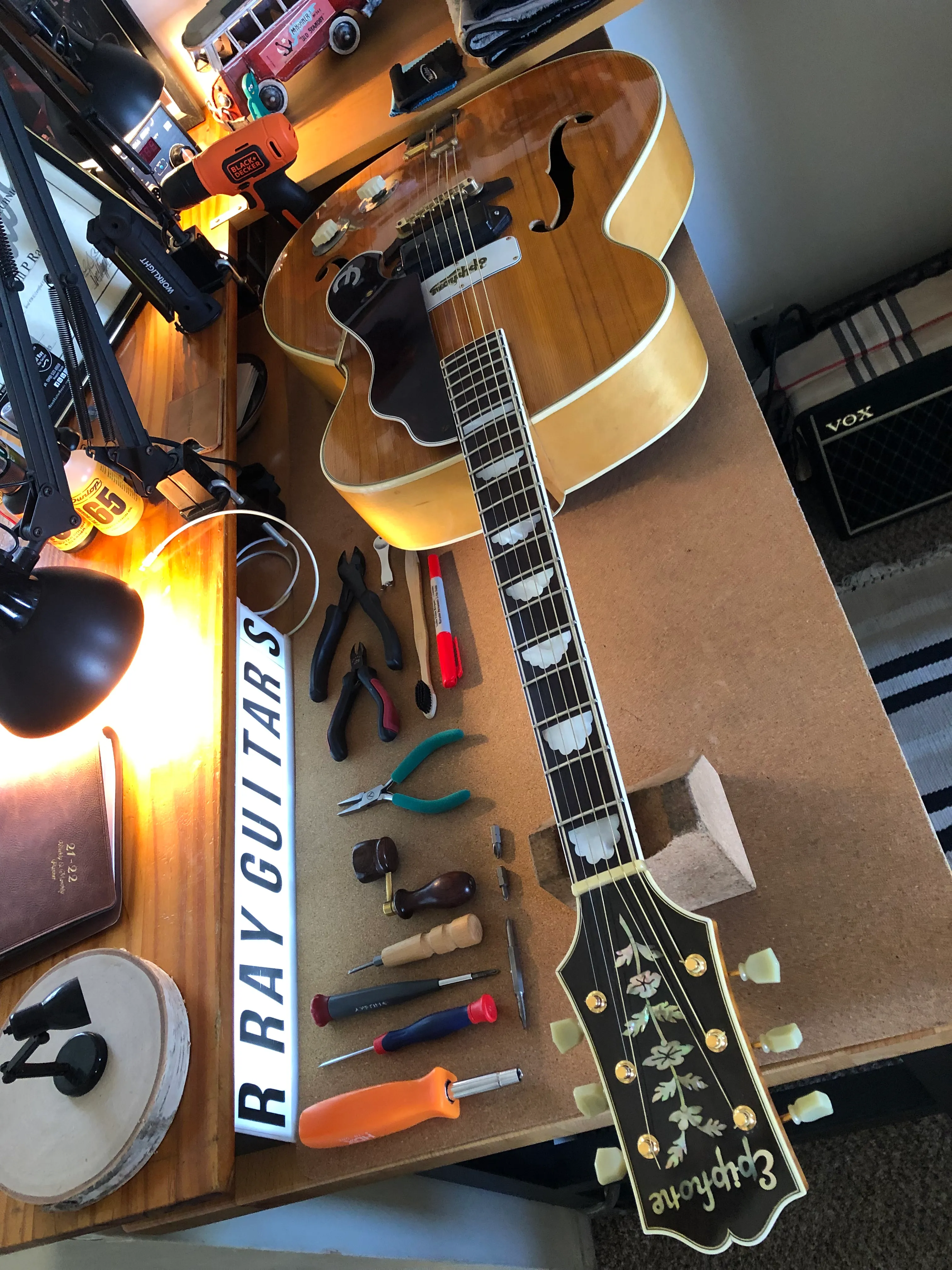 Gallery image 20 showing guitar repair work