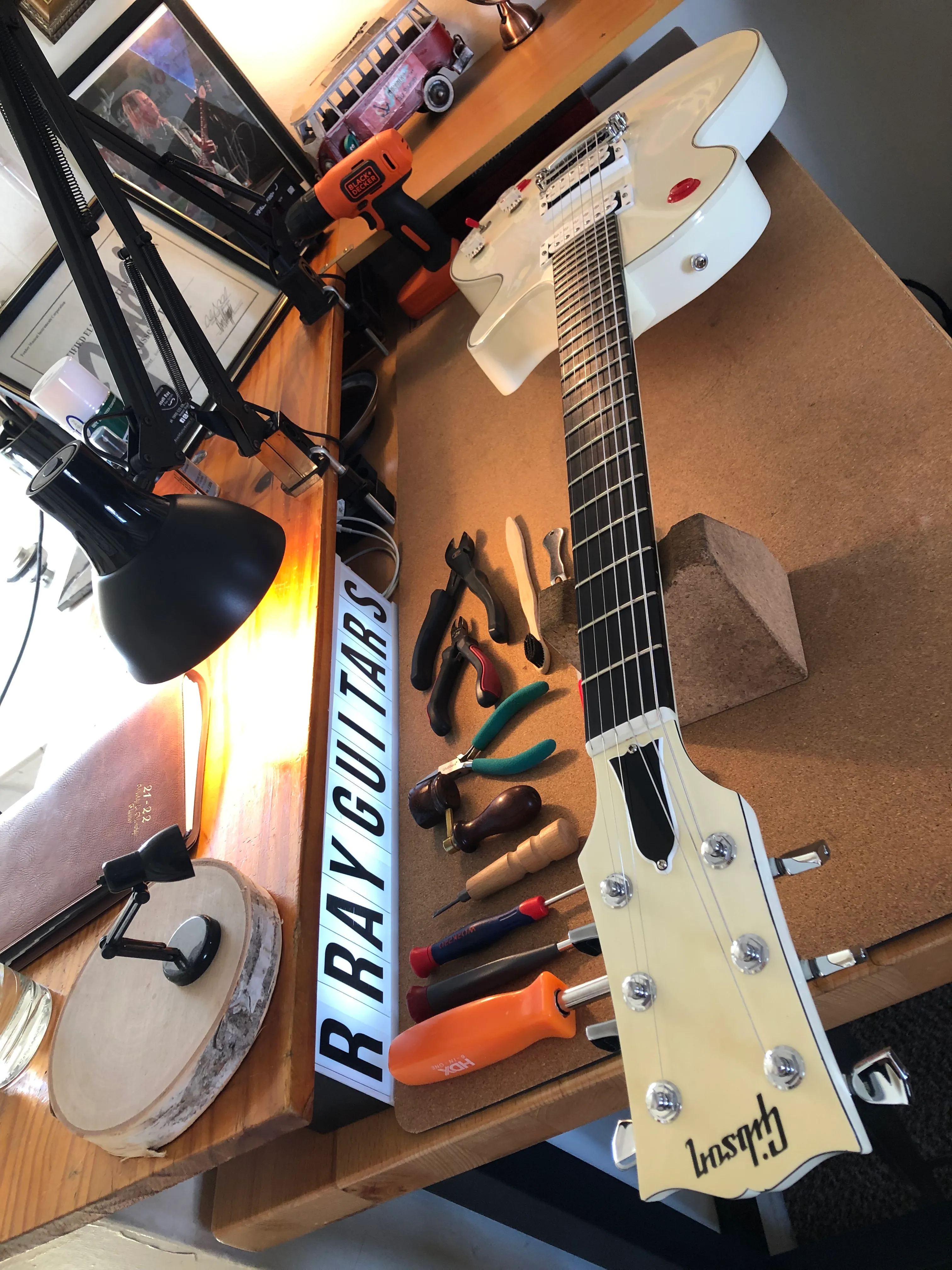 Gallery image 27 showing guitar repair work