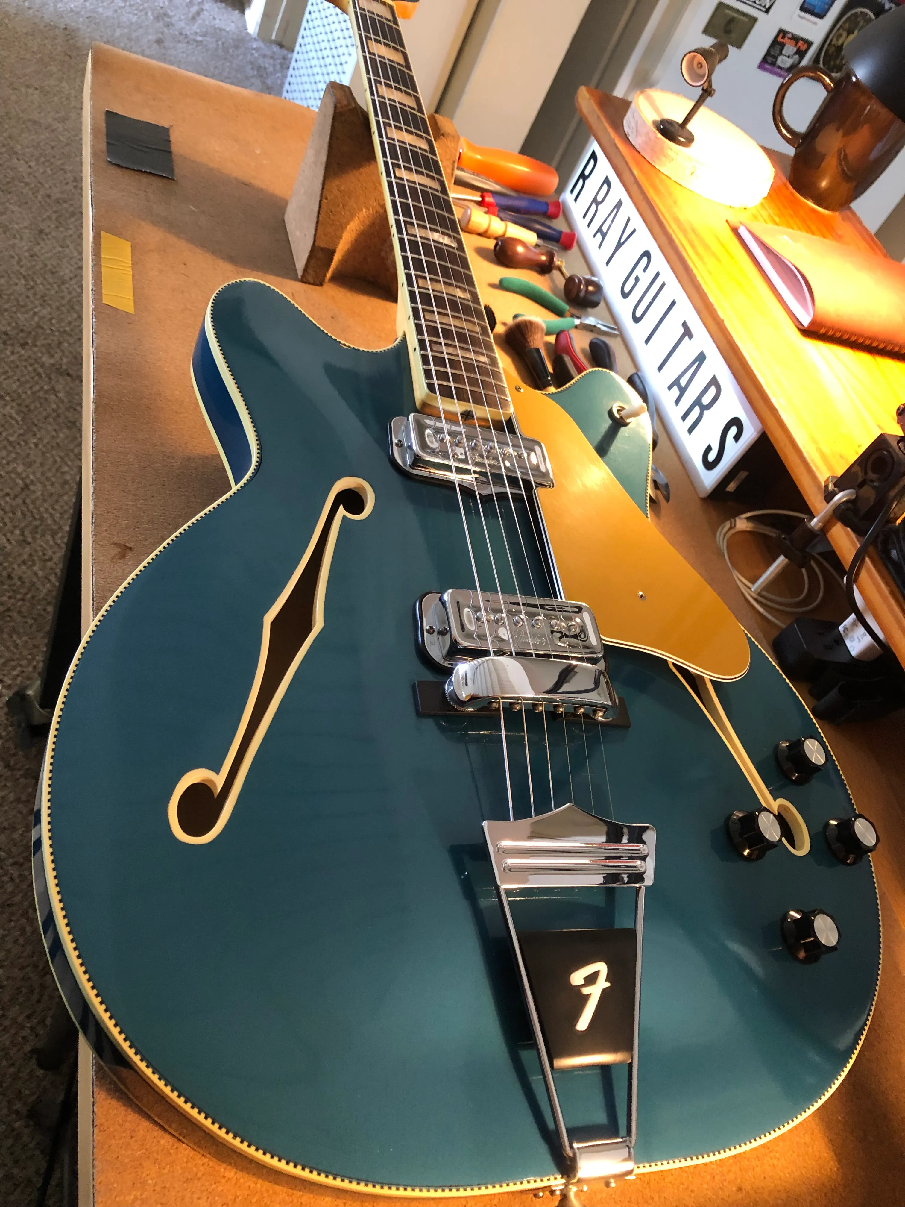 Gallery image 32 showing guitar repair work