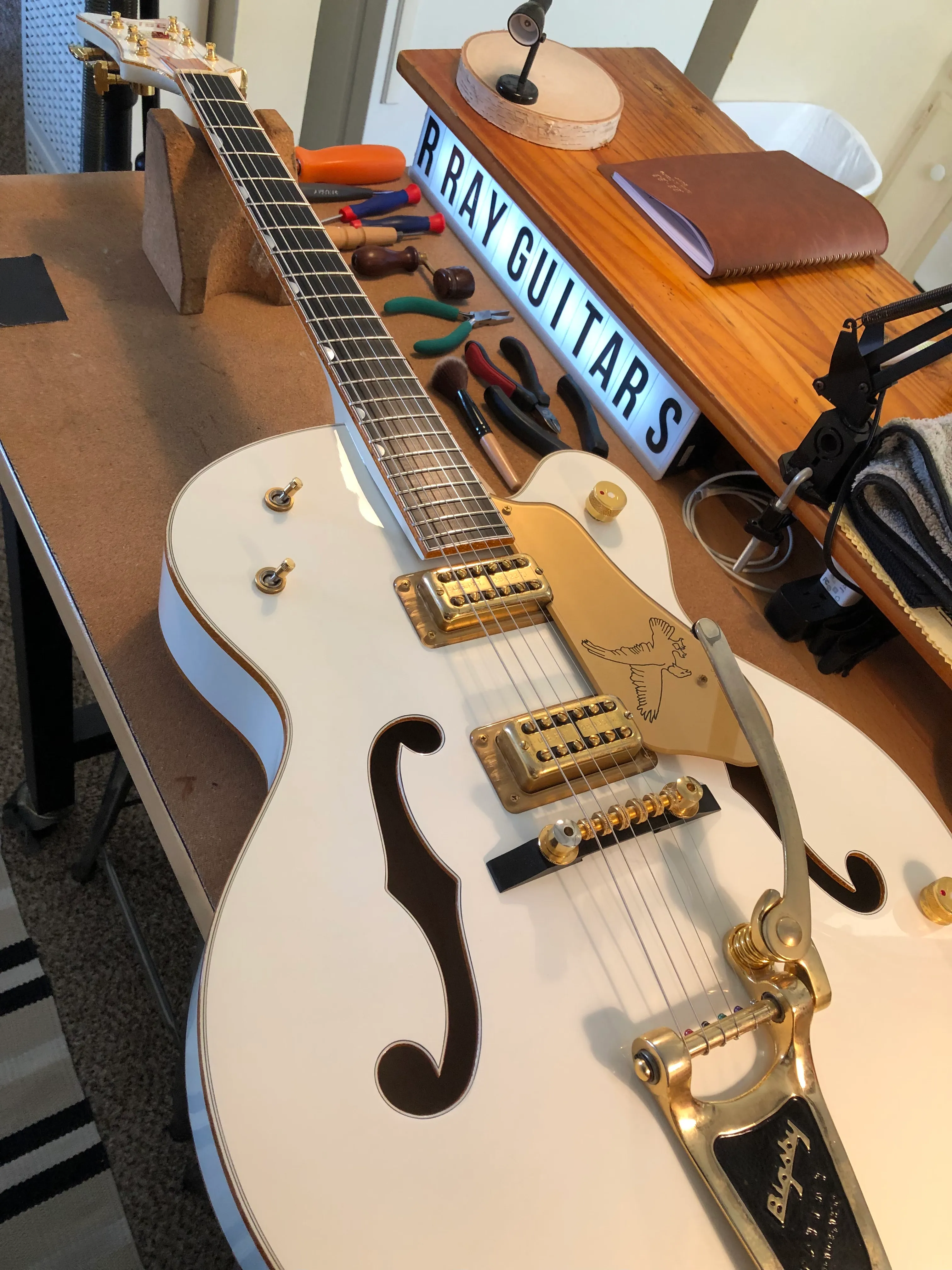 Gallery image 34 showing guitar repair work