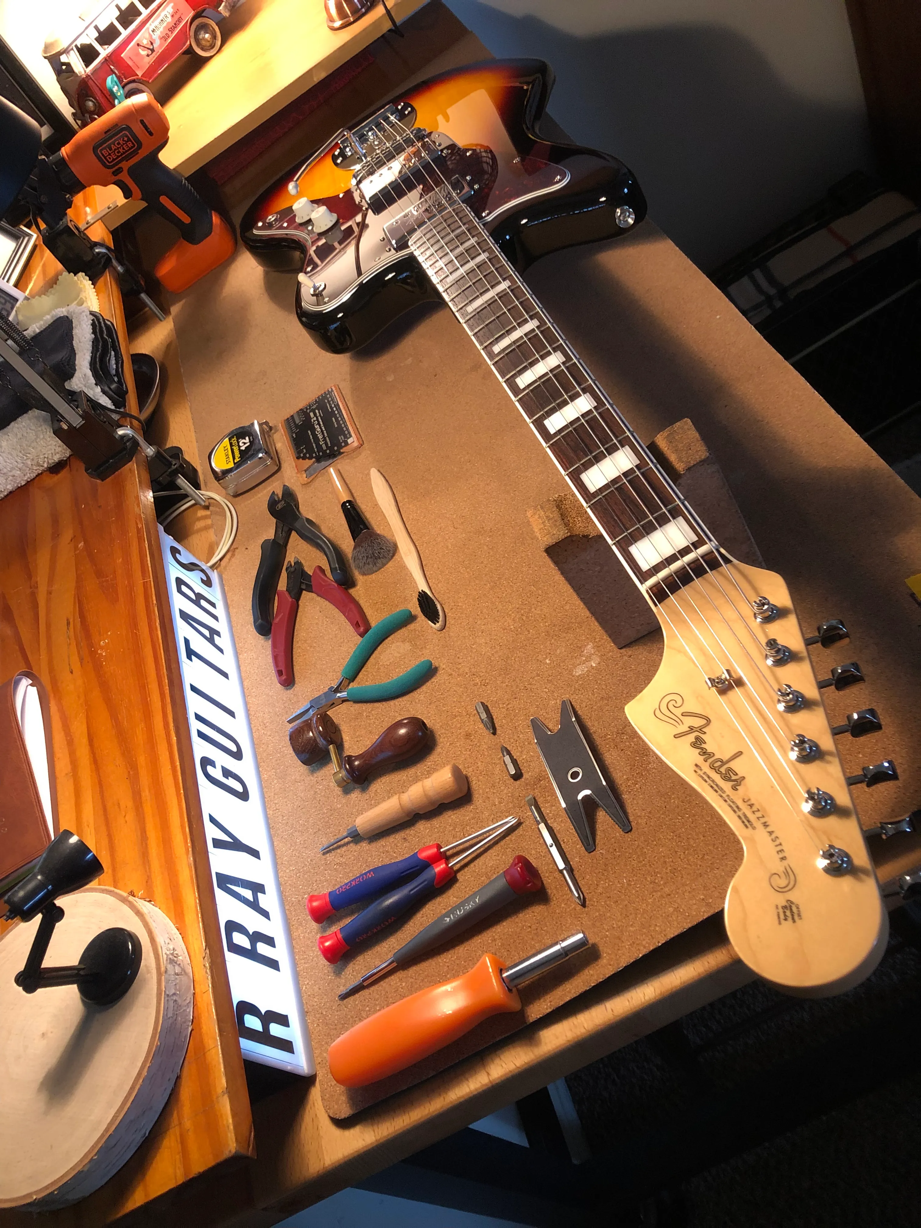 Gallery image 37 showing guitar repair work