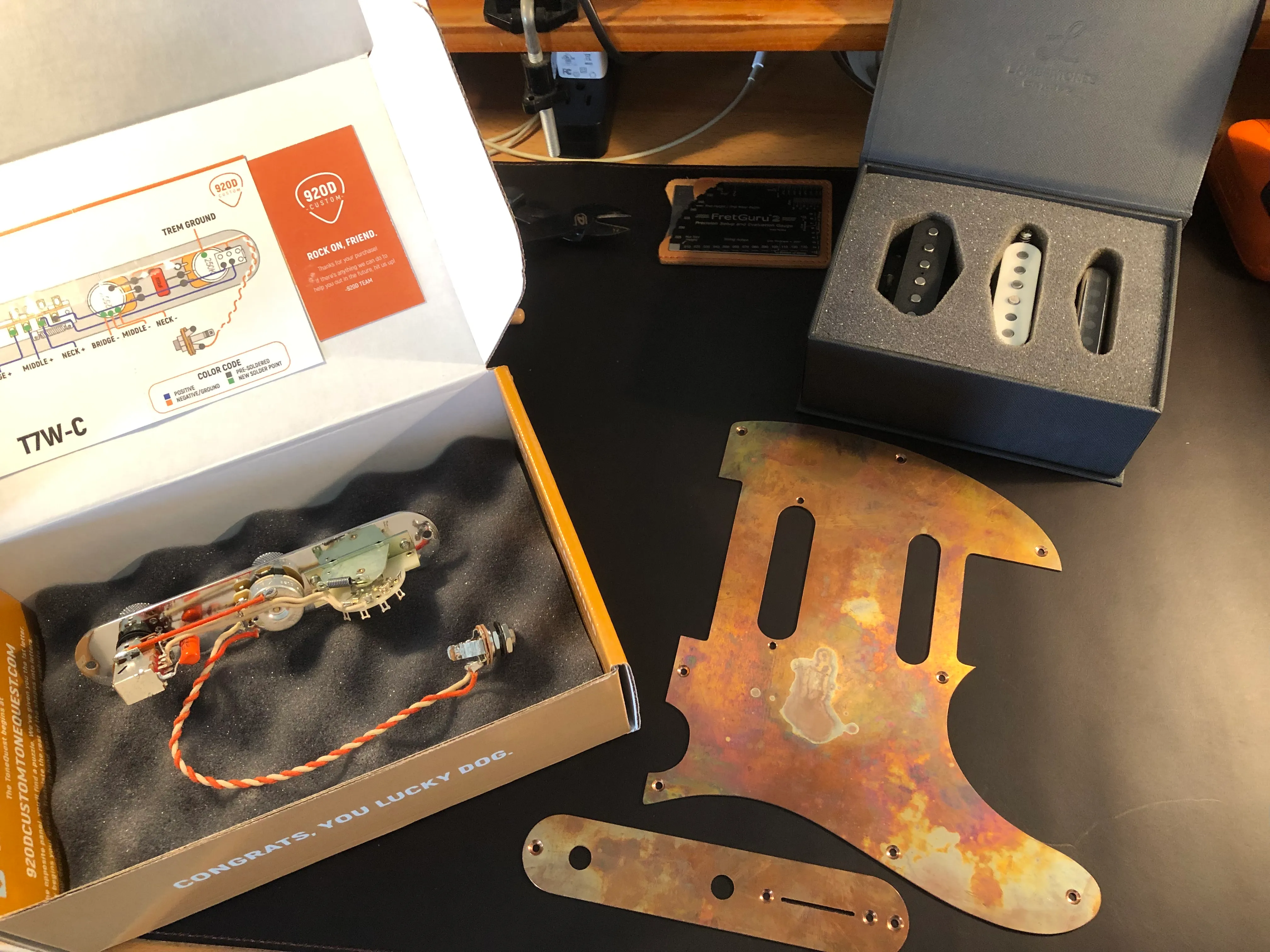 Gallery image 38 showing guitar repair work