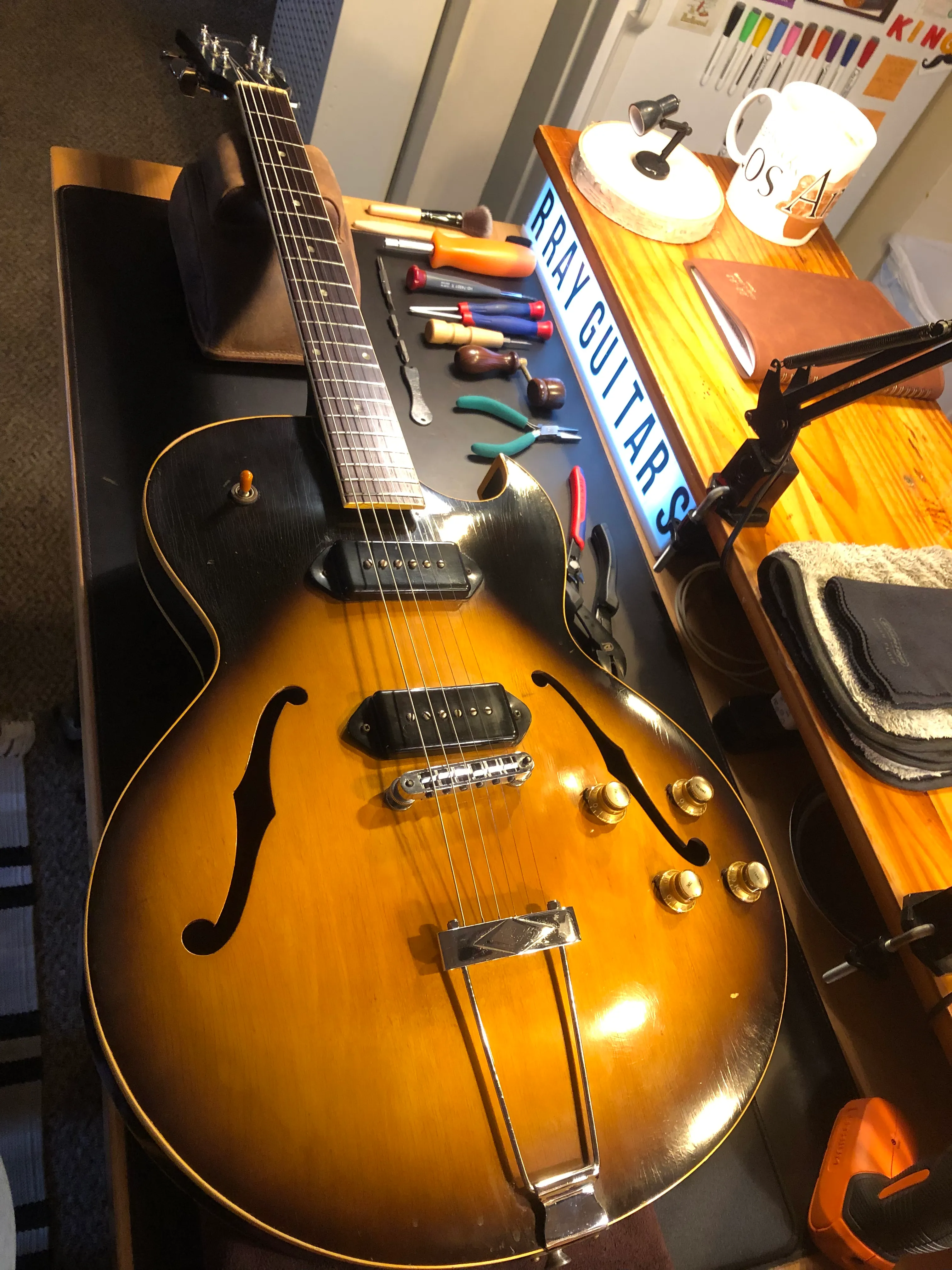 Gallery image 42 showing guitar repair work