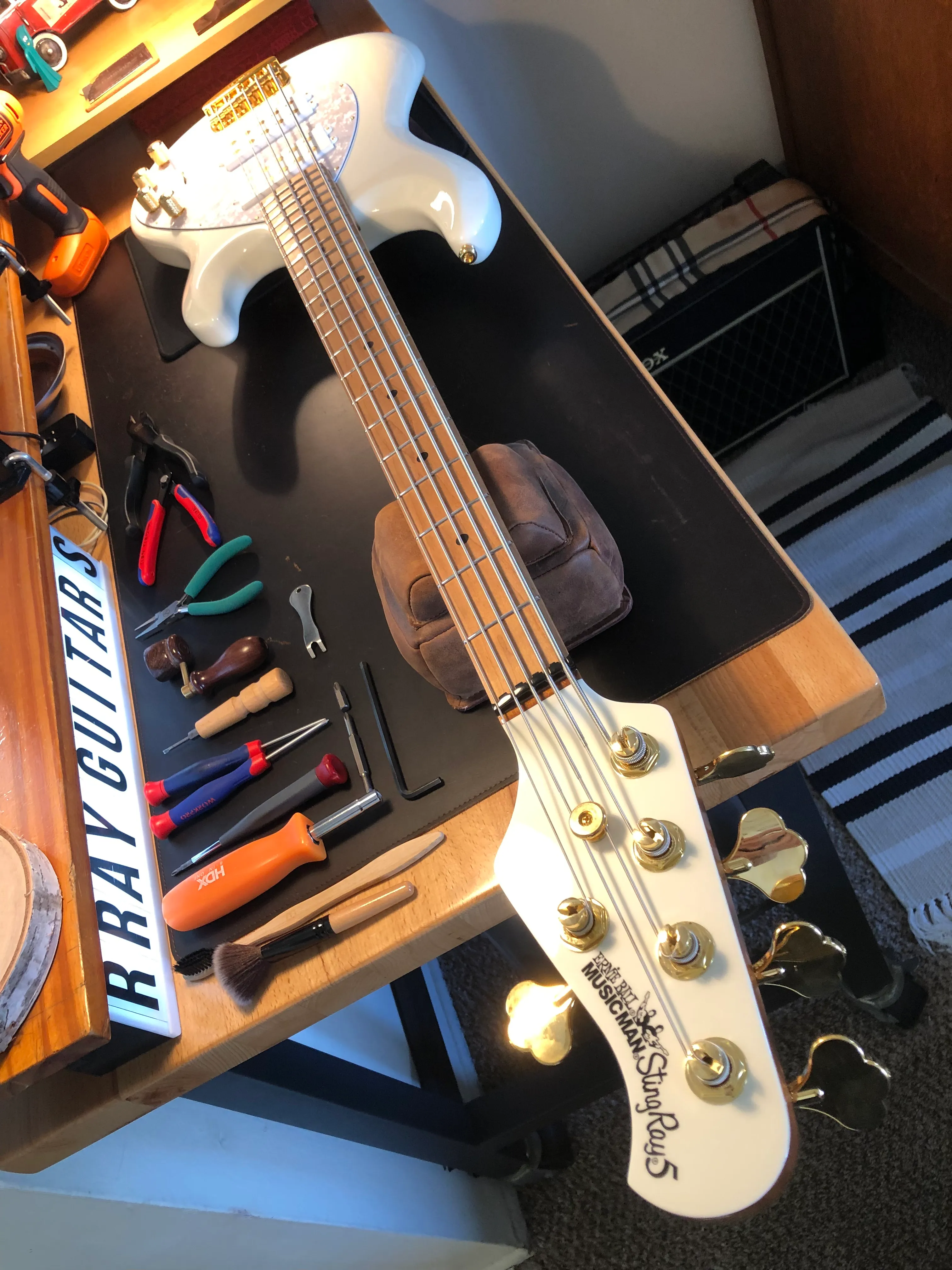 Gallery image 43 showing guitar repair work