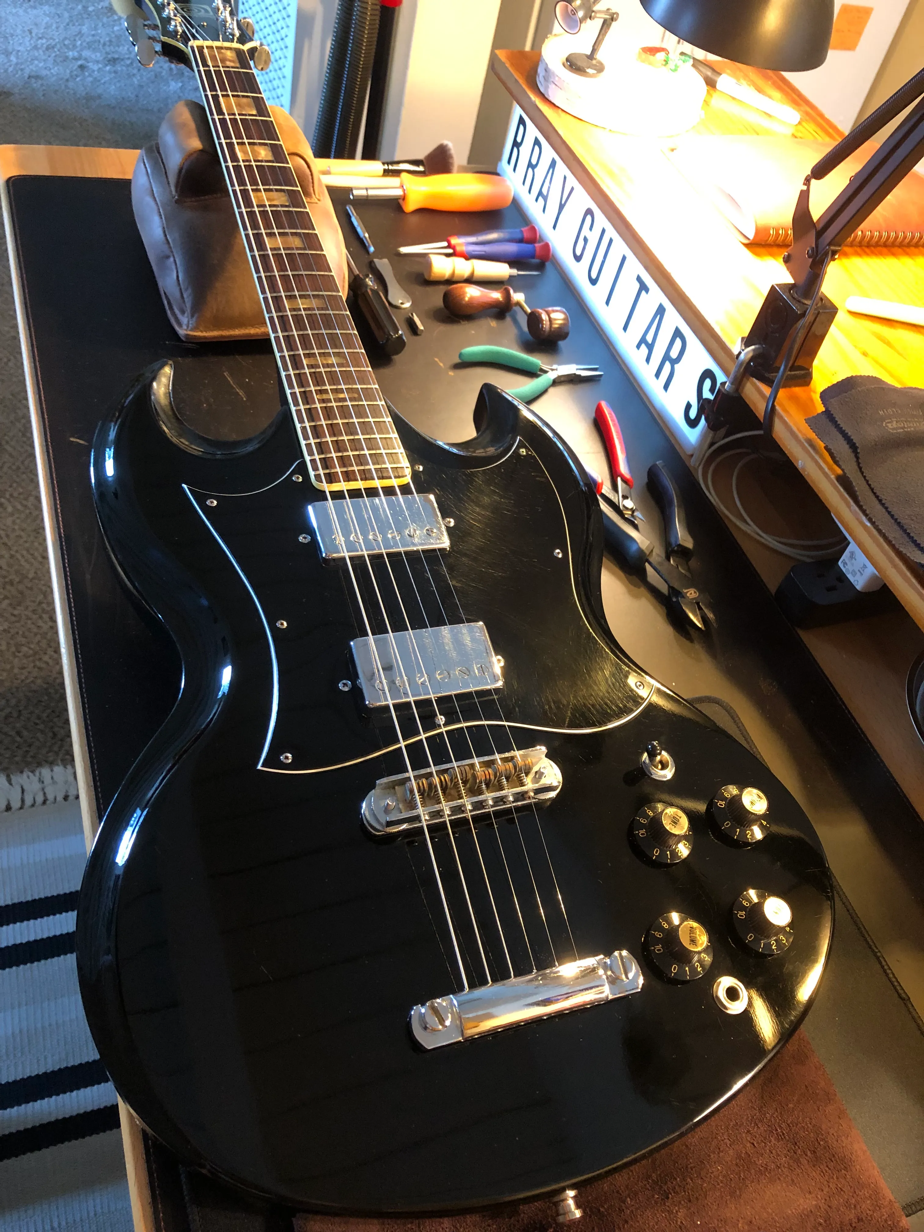 Gallery image 44 showing guitar repair work