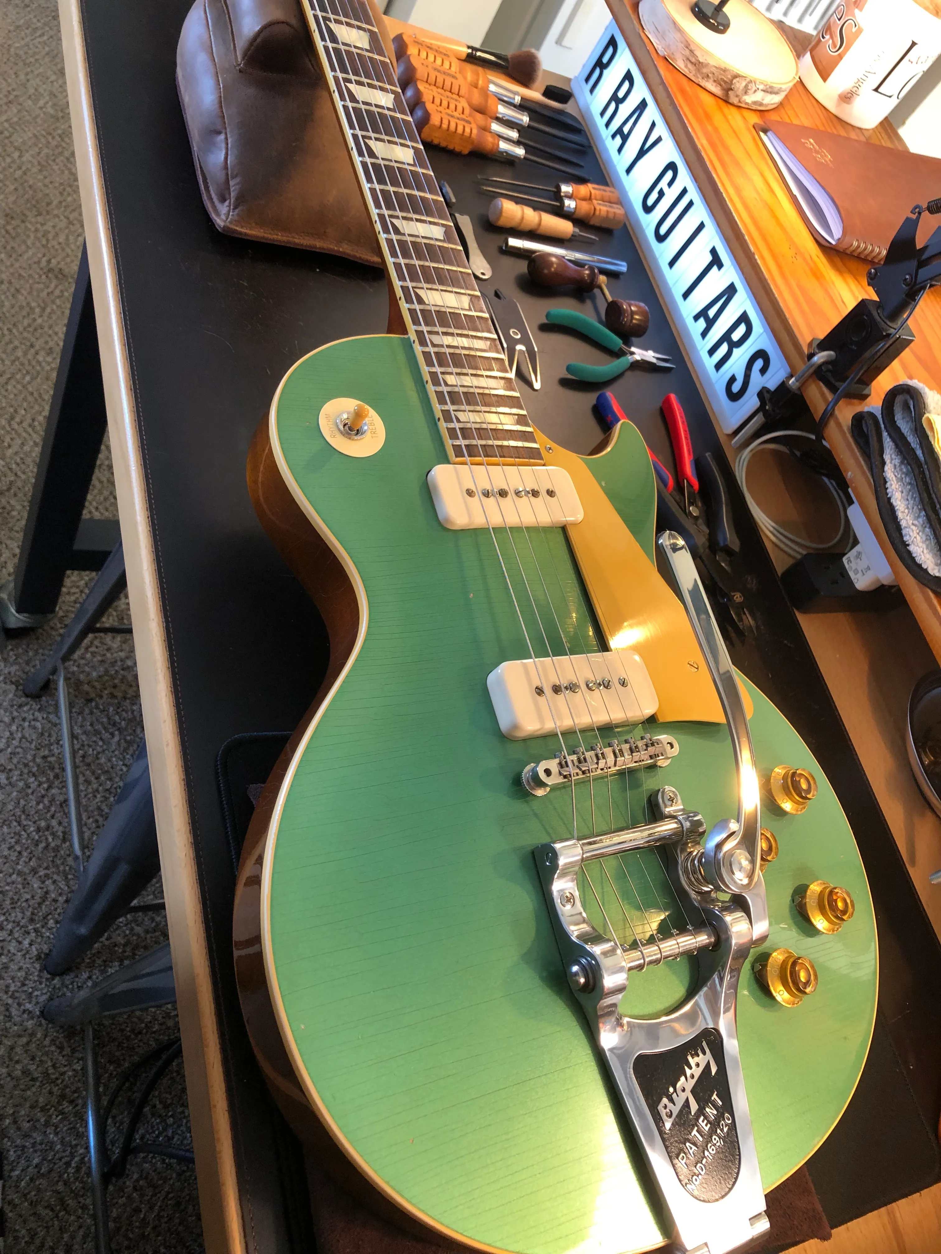 Gallery image 48 showing guitar repair work