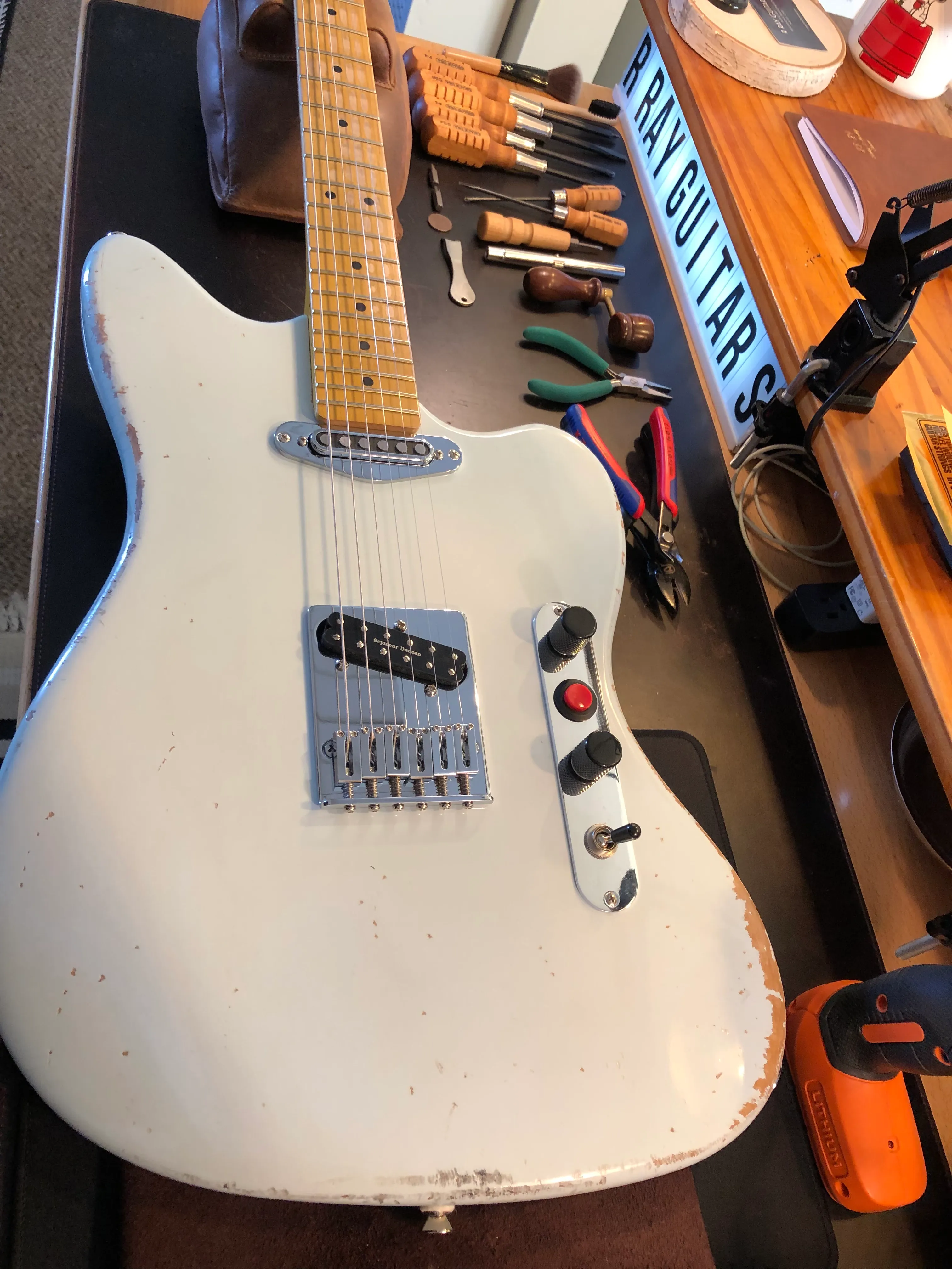 Gallery image 54 showing guitar repair work