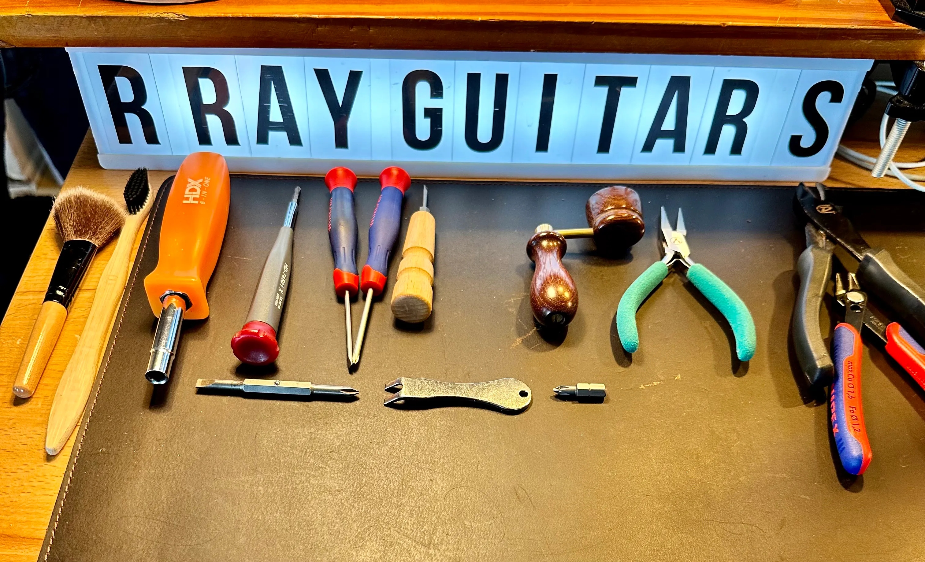 Gallery image 59 showing guitar repair work