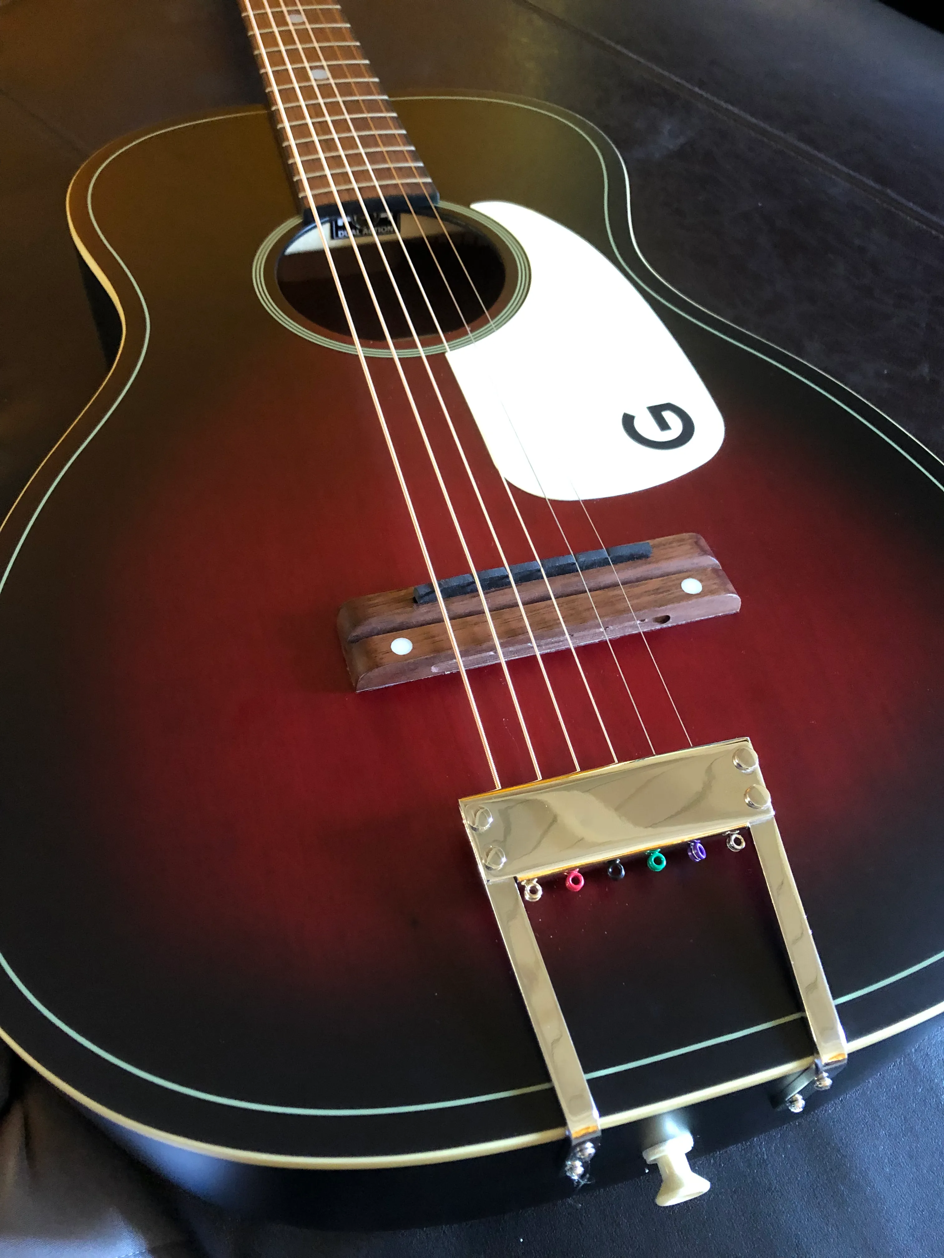 Acoustic-electric guitar on the R. Ray Guitars workbench in Newport Beach
