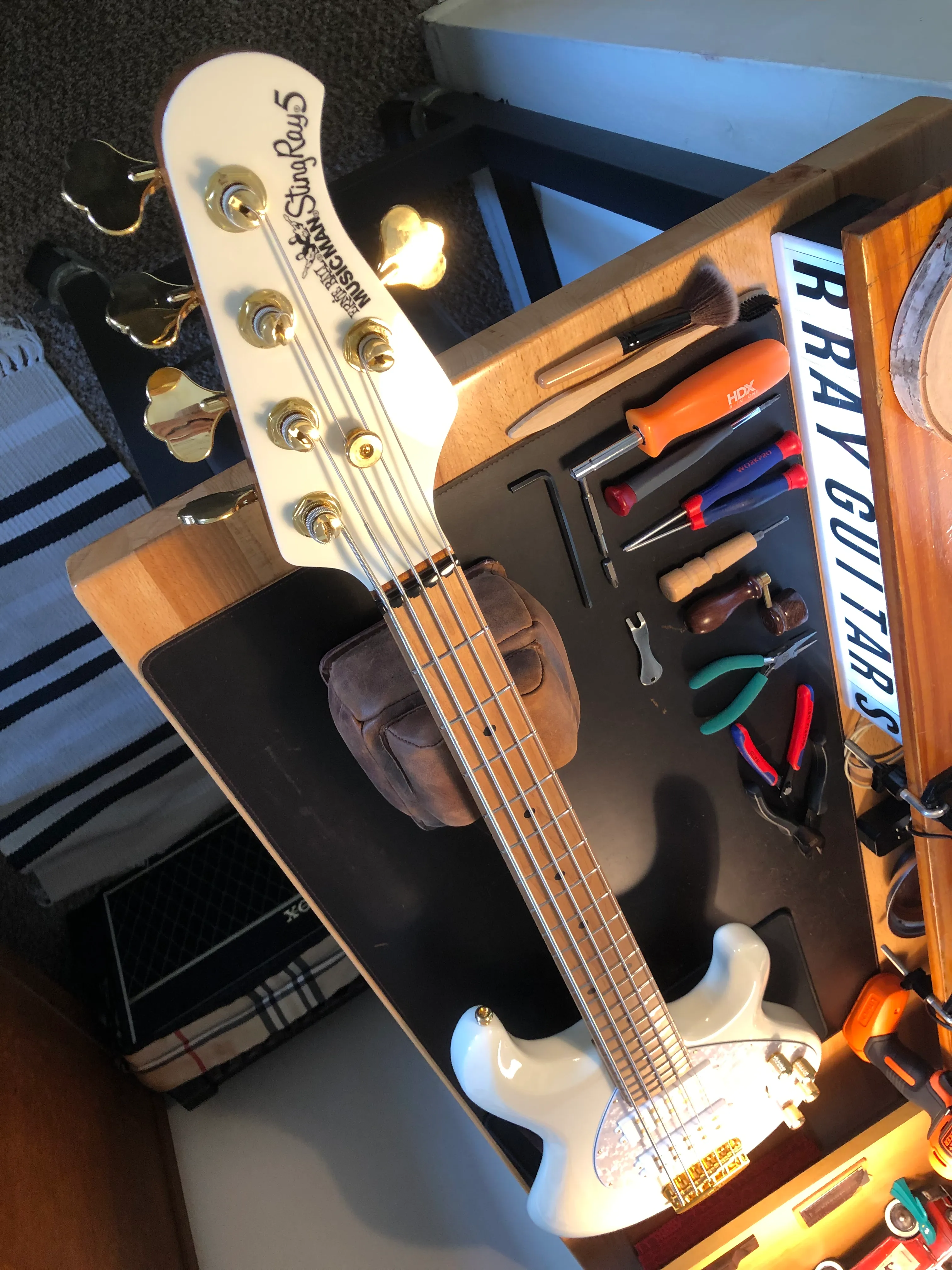Music Man StingRay 5 bass guitar on the R. Ray Guitars workbench