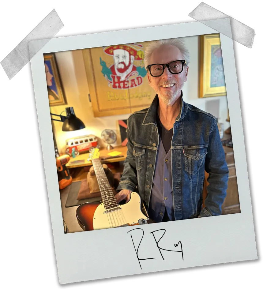 Russell Ray working on a guitar